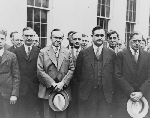 President Coolidge with reporters, 1929 