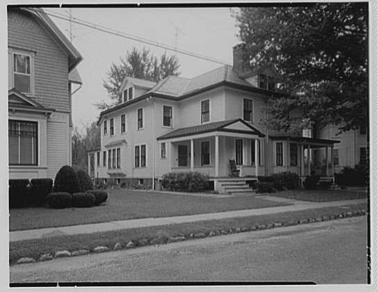 Home at 21 Massasoit Street, Northampton, with Coolidge's favorite place - the front porch - and rocking chair in plain view. 