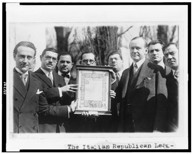 President Coolidge being presented an original parchment of the Gettysburg Address by the Italian Republican League of New York, February 12, 1927. 