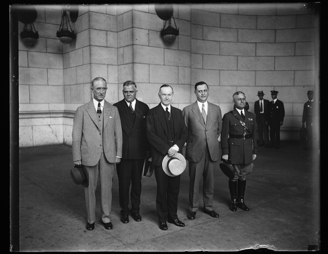 Taken the following year, 1929, as President Coolidge steps aside from the Presidency, Colonel Starling and Everett Sanders stand with their Chief one last time as the Coolidge years come to a close. 