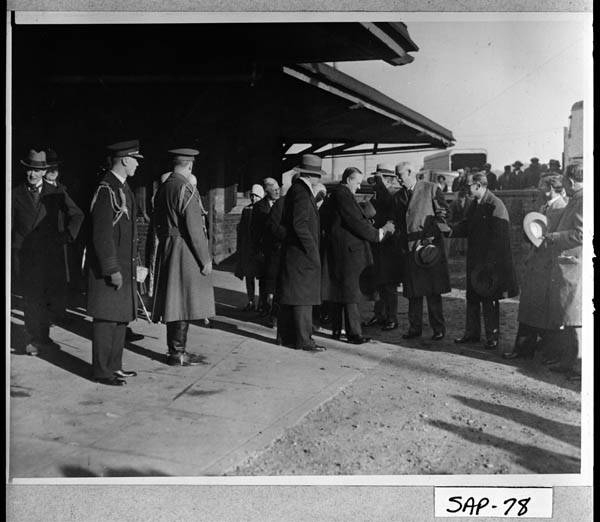 President and Mrs. Coolidge arrive at the train station in Brunswick, Georgia, before heading out to Sapelo Island. 