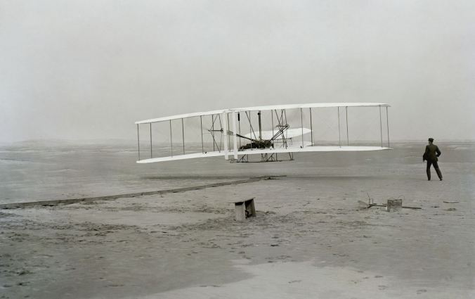The first flight at Kitty Hawk by the Wright brothers, December 1903. 