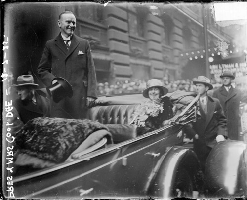 President and Mrs. Coolidge outside the La Salle Hotel during their visit to Chicago, 1925. 