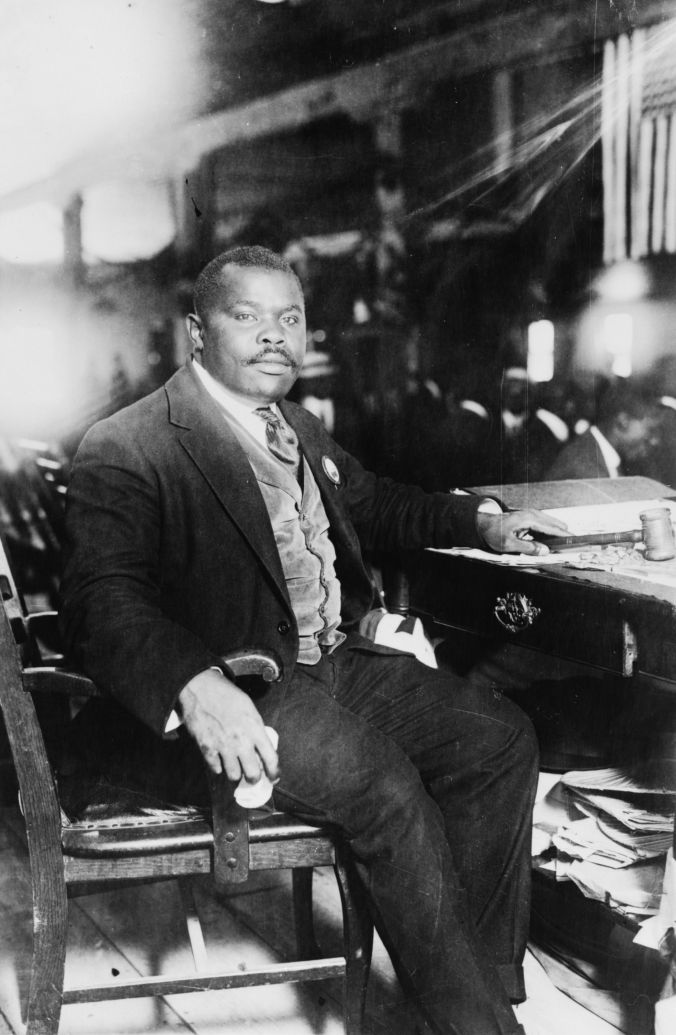 Marcus Garvey, native-born Jamaican, established and led the Universal Negro Improvement Association. Many, including DuBois, perceived him as a dire threat to blacks everywhere. This photograph was taken in the summer of 1924. He would leave his mark on movements around the world, including the Rastafari movement, which considers him a prophet. His second wife,  Amy Jacques Garvey, petitioned President Coolidge for his release, which was granted in November 1927 followed by deportation back to Jamaica. 