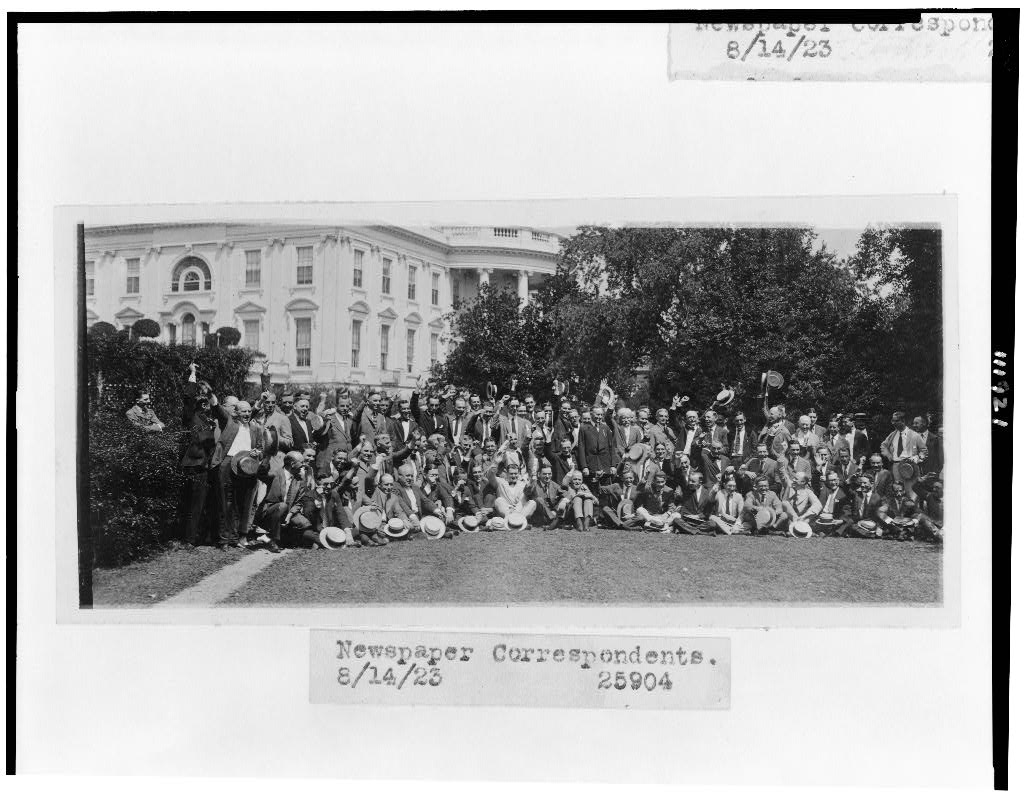 President Coolidge poses with the Washington correspondents corps on the lawn of the White House, August 14, 1923. The press, not without its biases and healthy curiosity even then, remained fair to Coolidge throughout his five years and seven months in office. They had their hostile critics, like correspondent Frank Kent and others, but none walked in the unquestioned conformity they largely do today. Coolidge could honestly assess their coverage in these terms: "You have been, I think, quite successful in interpreting the administration to the country. I have known that I wasn't much of a success in undertaking newspaper work, so I have left the work of reporting the affairs of my administration to the experts of the press. Perhaps that is the reason that the reports have been more successful than they would have been if I had undertaken myself to direct them" (March 1, 1929, The Talkative President, p. 34). Coolidge practiced what he preaches, letting the press do their job, free of forceful directives on what to report from the White House. 