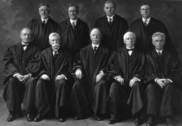 The Taft Court, 1925. Coolidge's new appointment, Justice Harlan Stone would join the majority for a strong Executive power against the three dissenters (Holmes, McReynolds and Brandeis), who favored Presidential deference to Congress. 