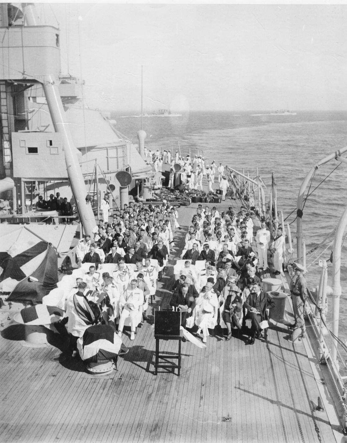 The Coolidges en route to Havana to attend the Sixth Pan American Conference, January 1928. They can be seen seated on the front row to the right on the deck of the USS Texas. 
