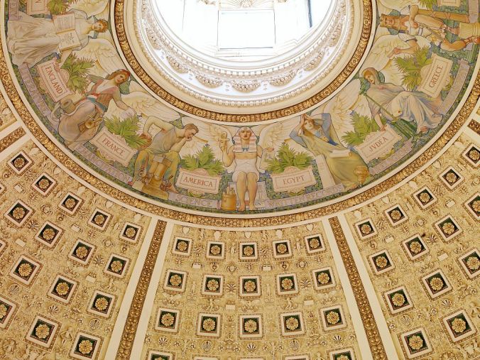 Looking up at the Dome of the Library of Congress, featuring the "Evolution of Civilizations" mural