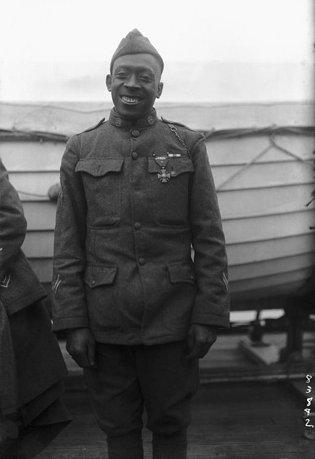 Corporal Johnson wearing the Croix de Guerre, bestowed on him by the French, 1918. 