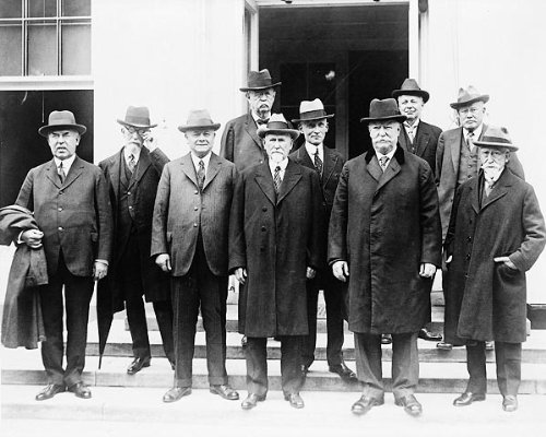 Chief Justice Taft and several Circuit Court judges, gathering for their annual conference, call upon President Coolidge at the White House. 