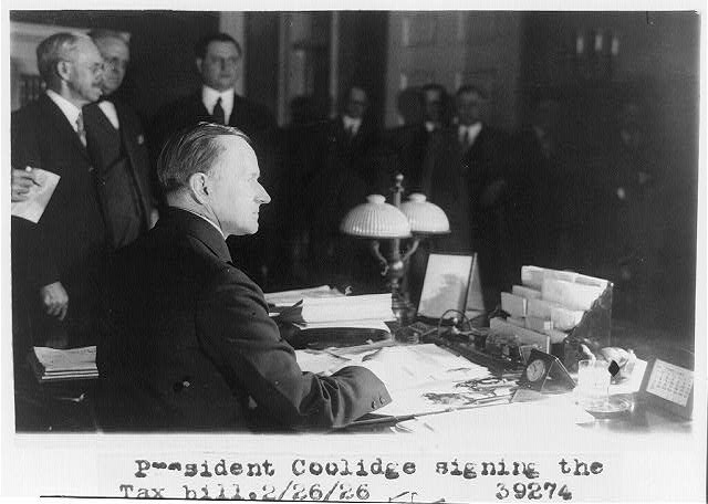 President Coolidge signs the Revenue Act of 1926, February 26, 1926 