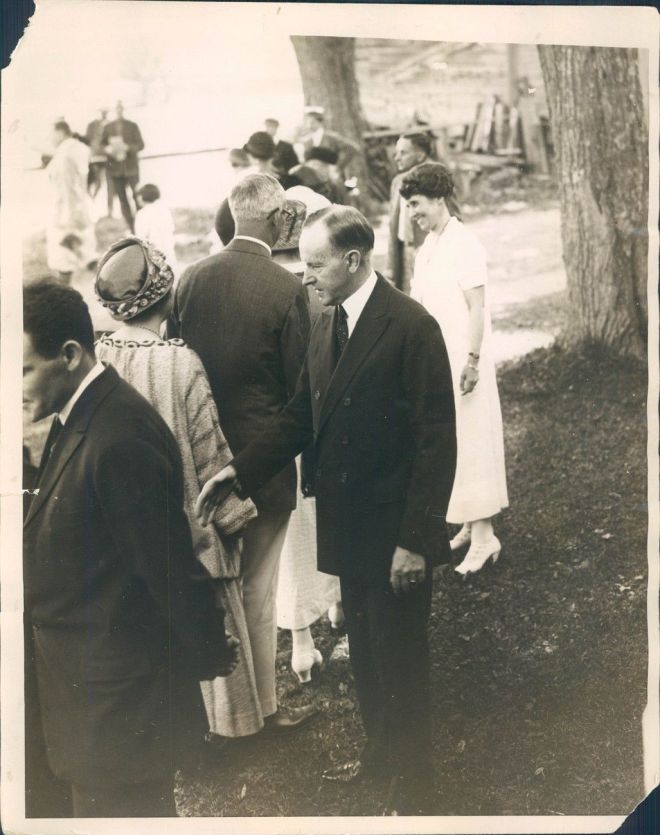 Calvin and Grace greeting Americans on the White House lawn 