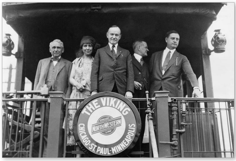 The President and party aboard a whistle stop tour through Minnesota, 1925. 