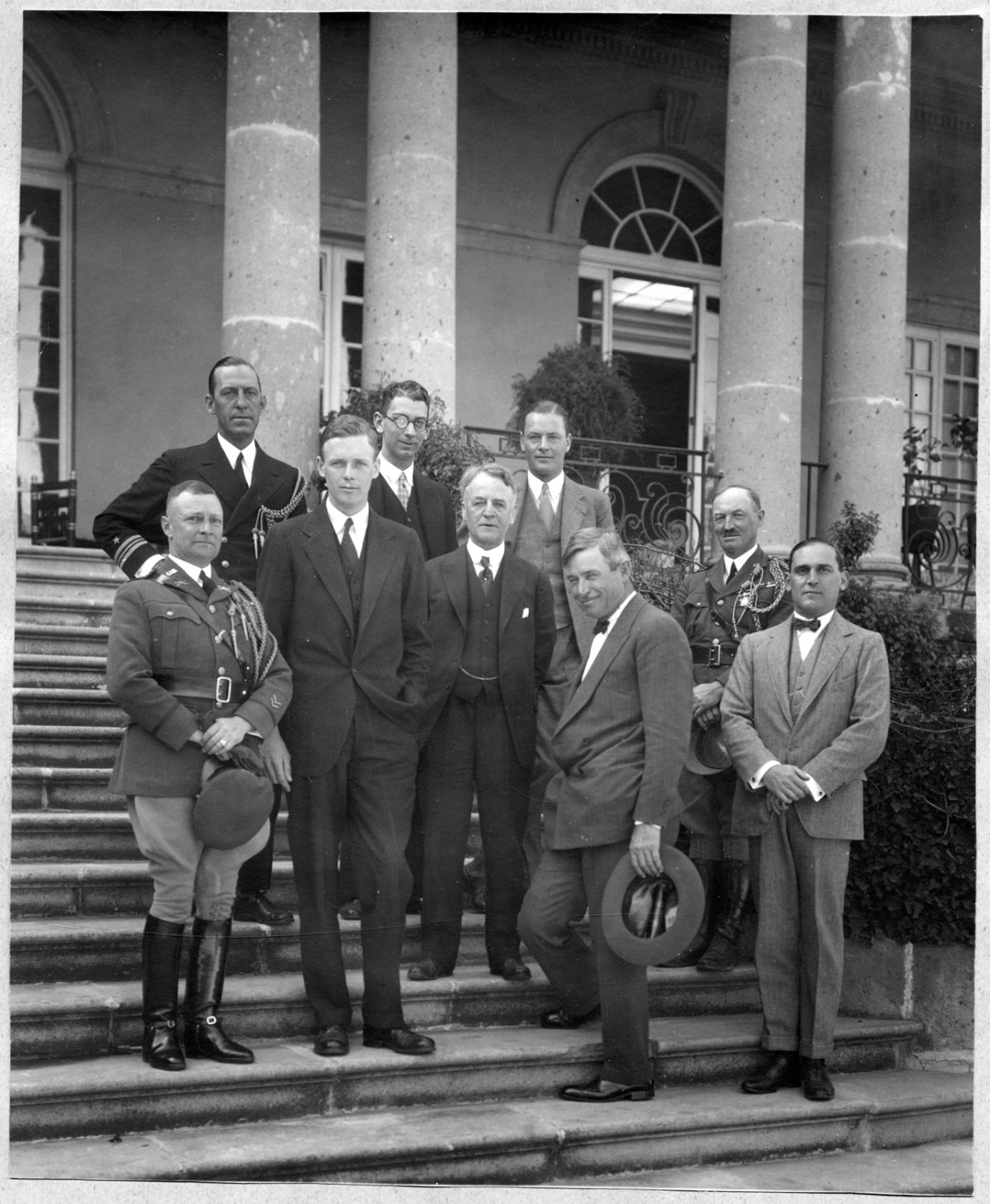 Ambassador Morrow, with his specially-chosen team of American envoys, including aviator Charles Lindbergh and humorist Will Rogers, Mexico City, 1927. http://consecratedeminence.wordpress.com/2014/03/16/the-lone-eagle-meets-the-ham-eggs-diplomat/. 