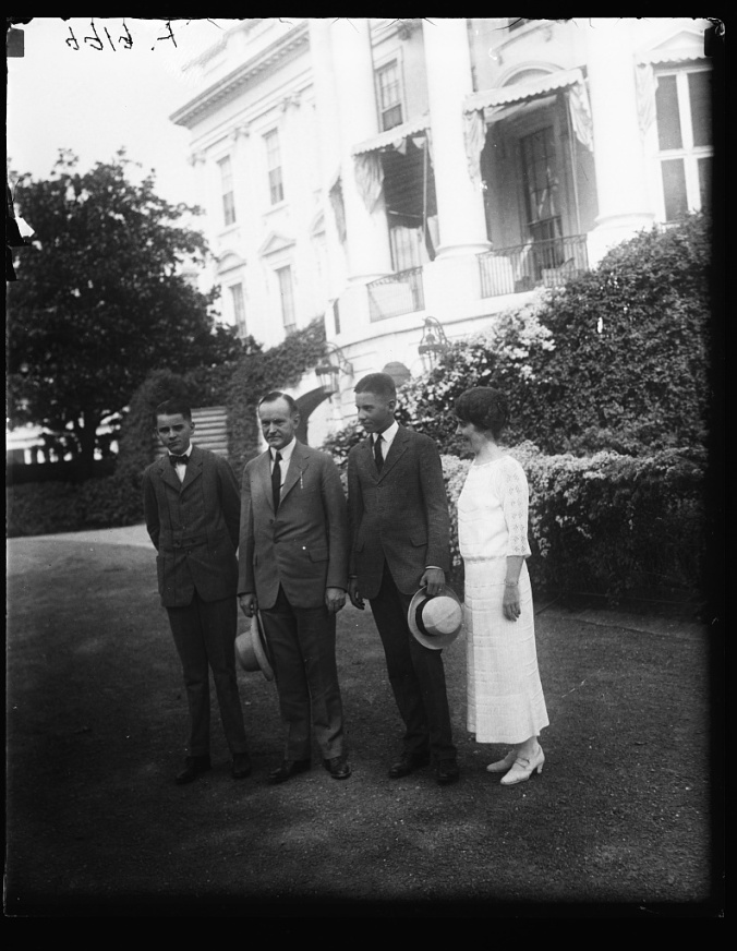 The Coolidge Family walking the grounds of the White House, August 1923. Courtesy of the Library of Congress. 