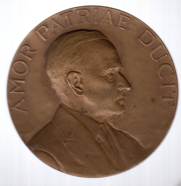 The medal presented to President Coolidge by the Union League. The inscription, Amor Patriae Ducit meaning, "Love of Country Leads." could not more aptly suit its recipient. 