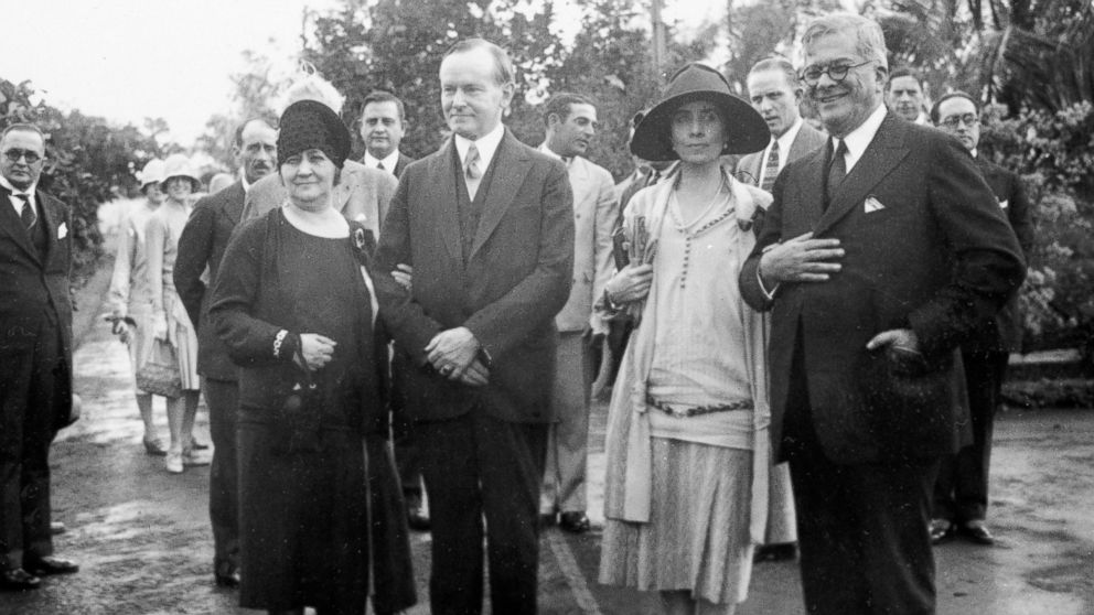 President and Mrs. Coolidge, visit the estate of Cuba's president at the time, General Gerardo Machado y Morales, whose wife, Elvira, stands to Coolidge's right, January 19, 1928. Courtesy of the Associated Press. 