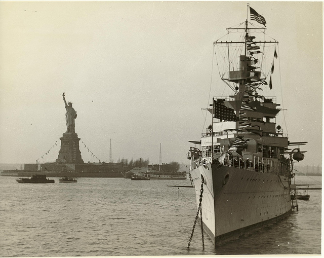 USS Indianapolis (CA-35), was laid down in Camden, New Jersey on 31 March 1930, launched in November the following year and commissioned in Philadelphia Navy Yard, 1932. She distinguished herself early as the President's flagship for his "Good Neighbor" cruise of Central and South America. Indianapolis would become the flagship of the prestigious Fifth Fleet. Engaged in simulated bombing exercises to the southwest of the Hawaiian Islands when Pearl Harbor was attacked, she immediately joined in the hunt for the Japanese carriers responsible. She would go on to take the fight to the enemy, going deep into hostile waters more than once during the war, supporting amphibious landings from Tarawa to Saipan, shooting down an enemy plane at the Battle of Philippine Sea, participating in the first attack on Tokyo since Doolittle's raids, serving as support for the landings at Iwo Jima, shelling beach defenses for seven straight days, shooting down six planes and helping to splash two others. Her final mission was the delivery of nuclear materials to be used on Hiroshima and Nagasaki, racing five thousand miles in ten days from San Francisco to Tinian. Hit by two torpedoes upon her return, she was torn open and sank in twelve minutes on 30 July 1945. The crew drifted two days in open ocean before finally being discovered by random patrols on 2 August, clinging to life, fending off sharks and waiting for rescue. Tragically, only 316 were recovered from a total count of 1,199. Despite her misfortune, she stands among the greatest of the Coolidge cruisers for her fortitude and perseverance. 