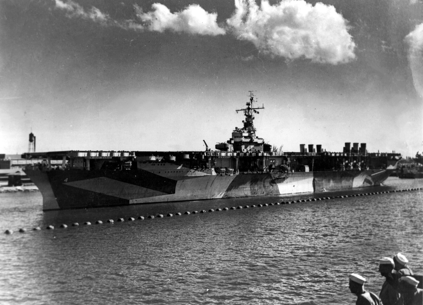 USS Ranger (CV-4), named for the famous sloop that had been the first ship flying the American flag to be saluted back in 1778, CV-4 was the first built from the keel up as a carrier. In a real sense, Coolidge made this essential component of America's navy possible when he approved the Cruiser Act. Laid down on 26 September 1931 in Newport News, Virginia, Ranger would be launched two years later and commissioned in 1934. She was returning from patrols in the Caribbean when the Japanese attacked Pearl Harbor. The largest carrier in the Atlantic Fleet at that time, she led the amphibious assault on French Morocco in 1942, launching 496 sorties over three days, forcing the enemy to capitulate before Allied pressure. Returning to home coasts, she patrolled the Atlantic seaboard until joined to the British Home Fleet, protecting the approaches to those islands. Taking the offensive to Germany's back door, she waged war in Norwegian waters, successfully targeting convoys, tankers, merchant ships and transports. Winding down her wartime service, Ranger carried planes to Casablanca then personnel to the Pacific and finally brought essential training to both air and sea units operating out of the west coast. Working her way back to the east coast, she retired from the service over a year after the end of the war, October 1946. 