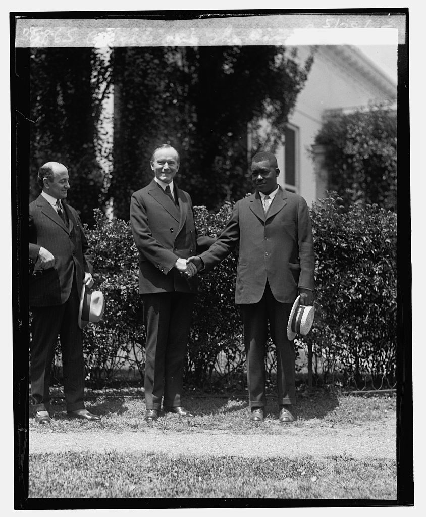President Coolidge visits with Mr. Thomas Lee at the White House, May 28, 1925. Mr. Lee was recognized for his heroic efforts rescuing those endangered when a steam vessel capsized suddenly on the Mississippi River. Courtesy of the Library of Congress. 