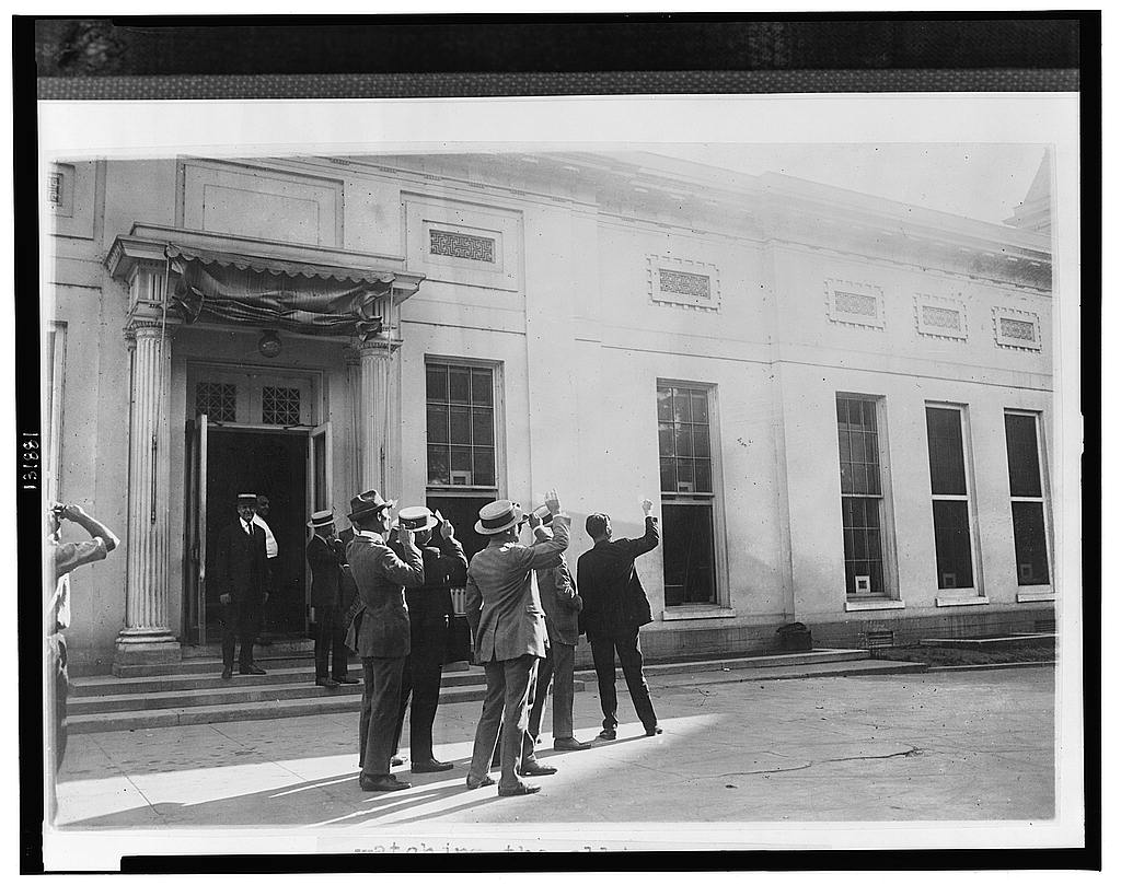 Watching the first solar eclipse during the Coolidge tenure from the Executive Offices, early morning of September 10, 1923. Courtesy of the Library of Congress. 