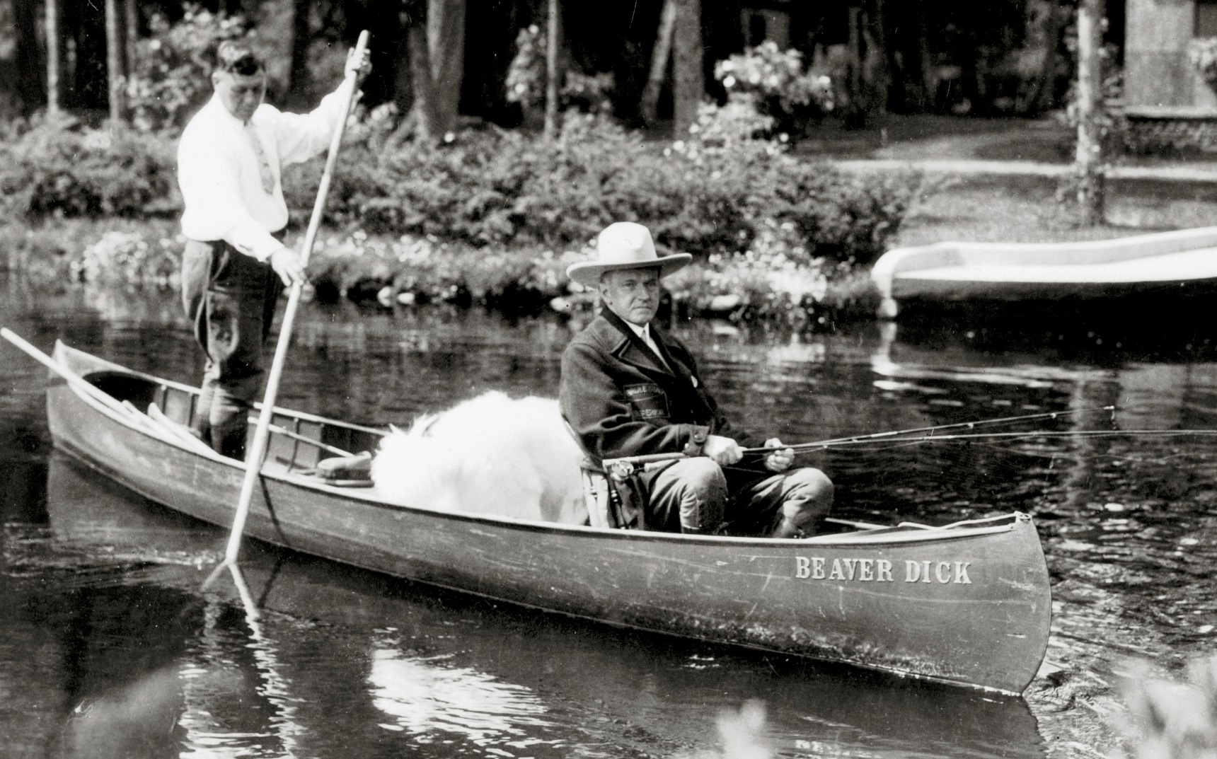 Coolidge, his dog Rob Roy, and his Brule River guide, John LaRock, 1928.  