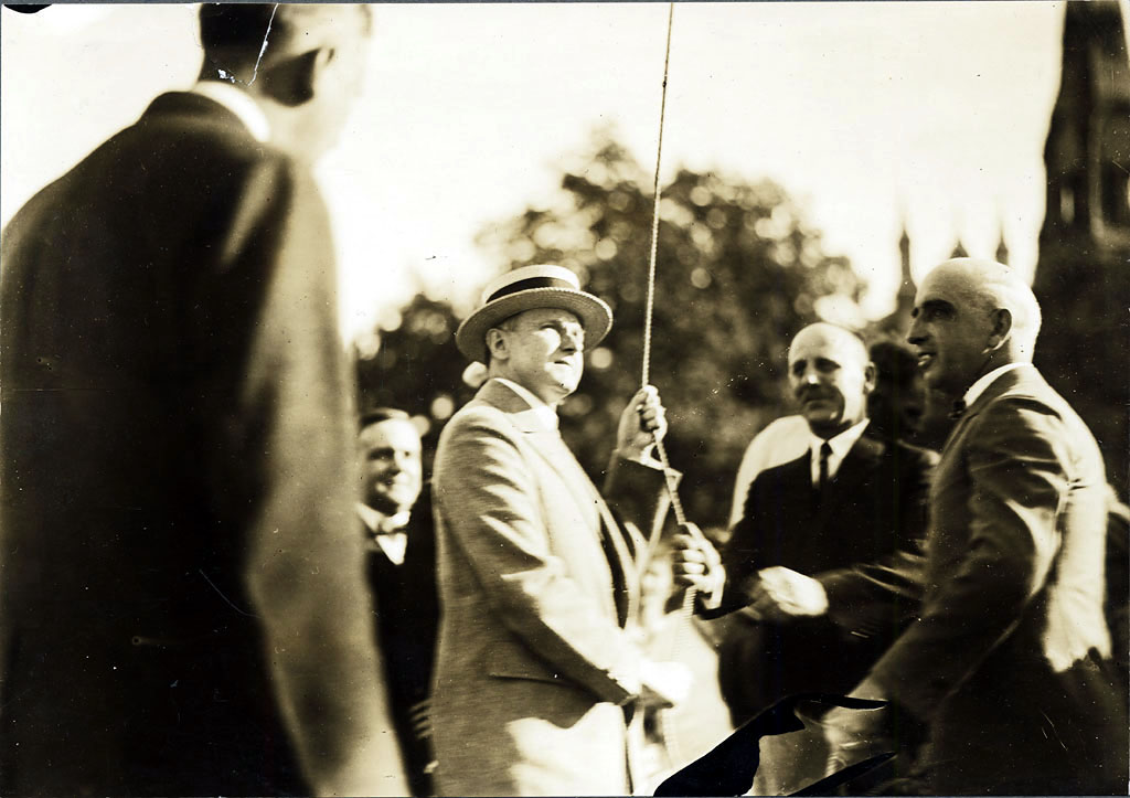 President Coolidge raises the flag over the Common at Lynn, Massachusetts, August 27, 1925. 