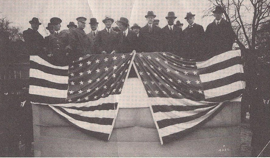 Gathering at the dedication of the hospital for veterans at Tuskegee, 1923. Then-Vice President Coolidge stands center above the flag to the right, to his left is Dr. Robert R. Moton, President of Tuskegee. Photo courtesy of Dan T. Williams, Archivist at Tuskegee University. 