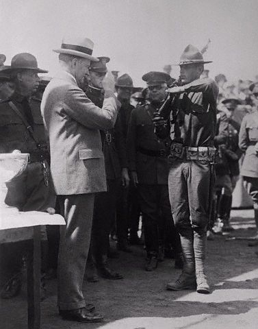 President Coolidge Saluting Soldier